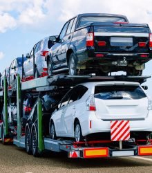 Cars carrier at the road of Poland. Truck transporter; Shutterstock ID 1164185080; PO Number - Raise a BBC PO Using Vendor No. 1150465: -; Employee Email: -